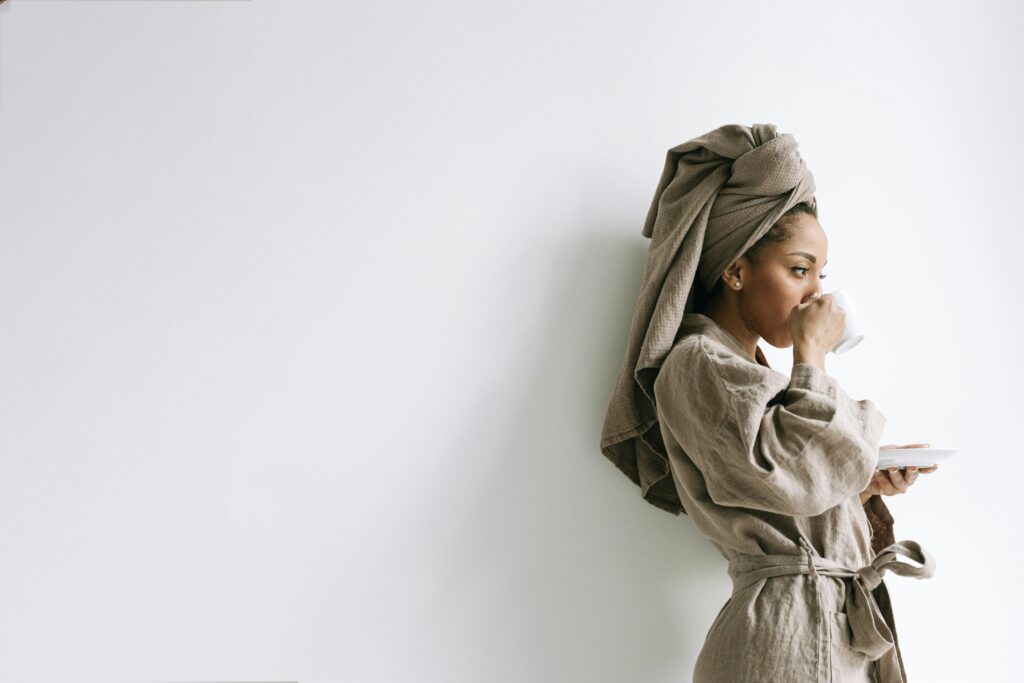 Woman Wearing a Bathrobe with Towel on her Head | Hustle Coffee